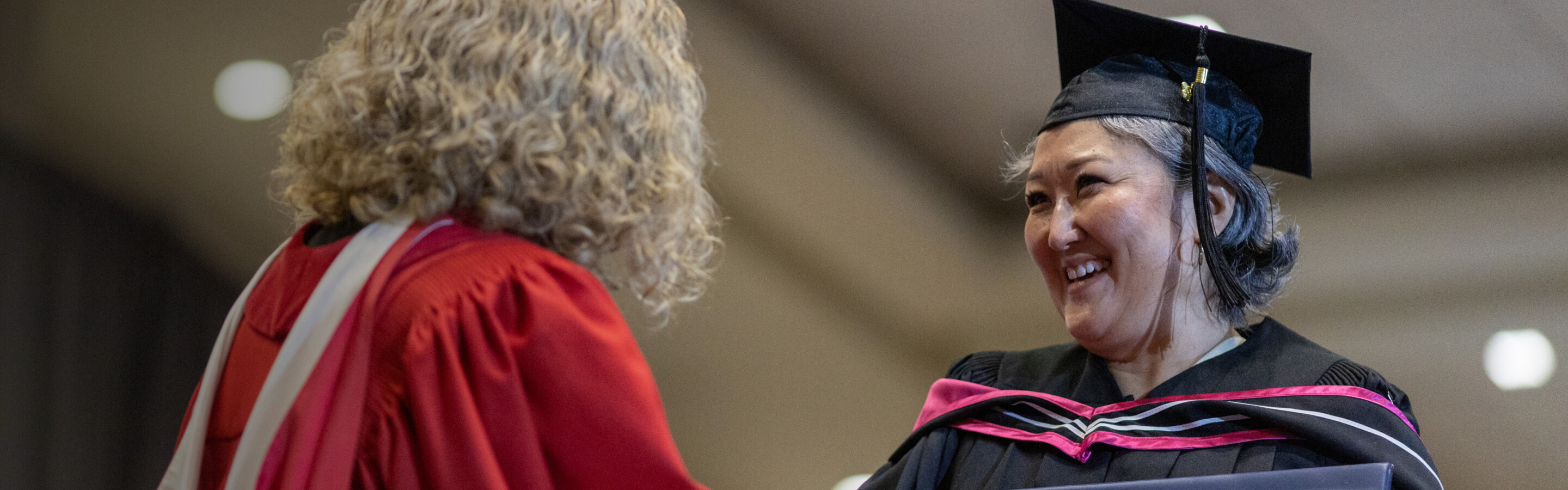 Graduate receiving diploma