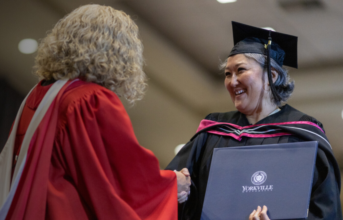 Graduate receiving diploma